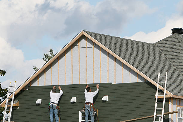 Professional Emergency Siding Repair technician working in Utica, NY